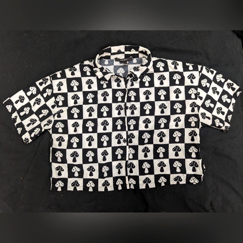 Whimsical black and white cropped shirt with mushrooms